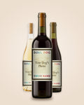 Three bottles, a Cabernet in front with a Chardonnay and a Pinot Noir either side, each with a sample label showing where your dog's photo and name go.